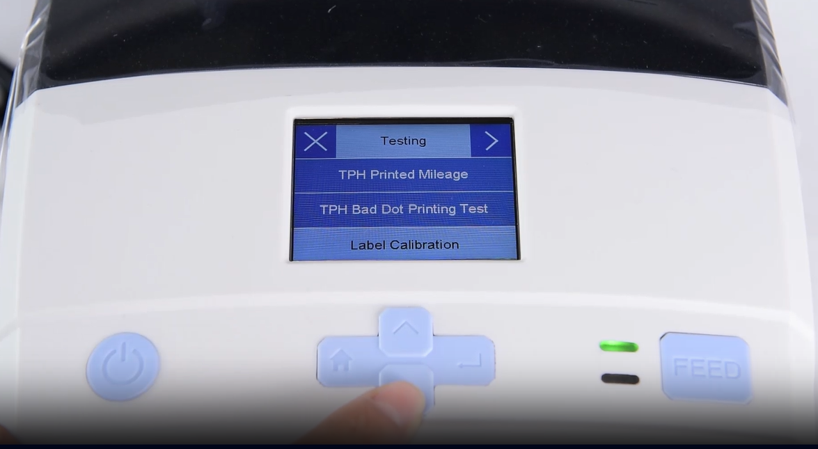 Az A close-up of a machine's digital interface showing a testing menu.